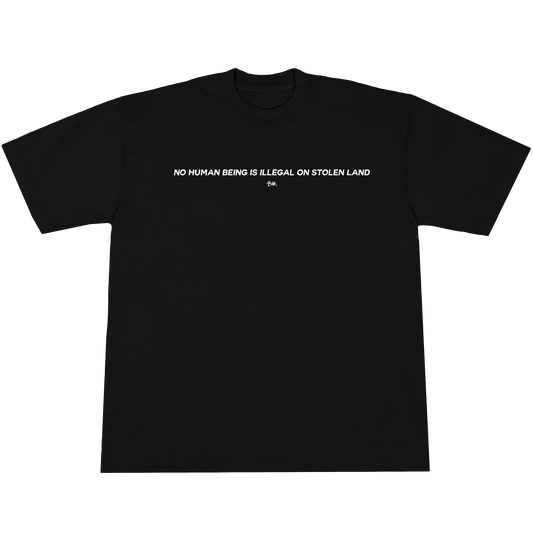 “No Human Being is Illegal on Stolen Land” Tee